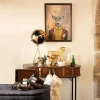 Caballo decorativo de madera dorado