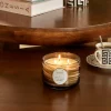 Vela perfumada en tarro de vidrio TONKA