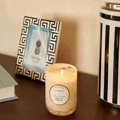 Vela perfumada en tarro de vidrio